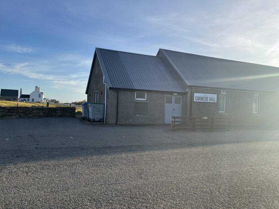 Exterior of Carnegie Community Hall, in the sunshine