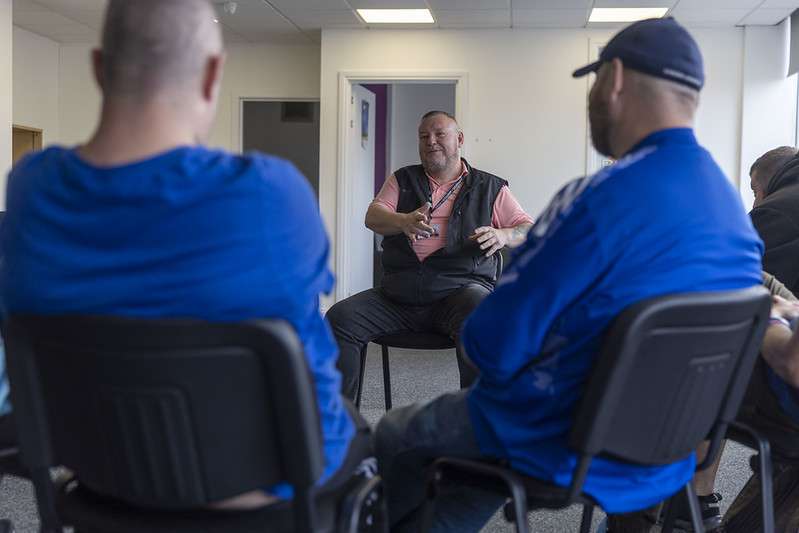 A group of men in a support group